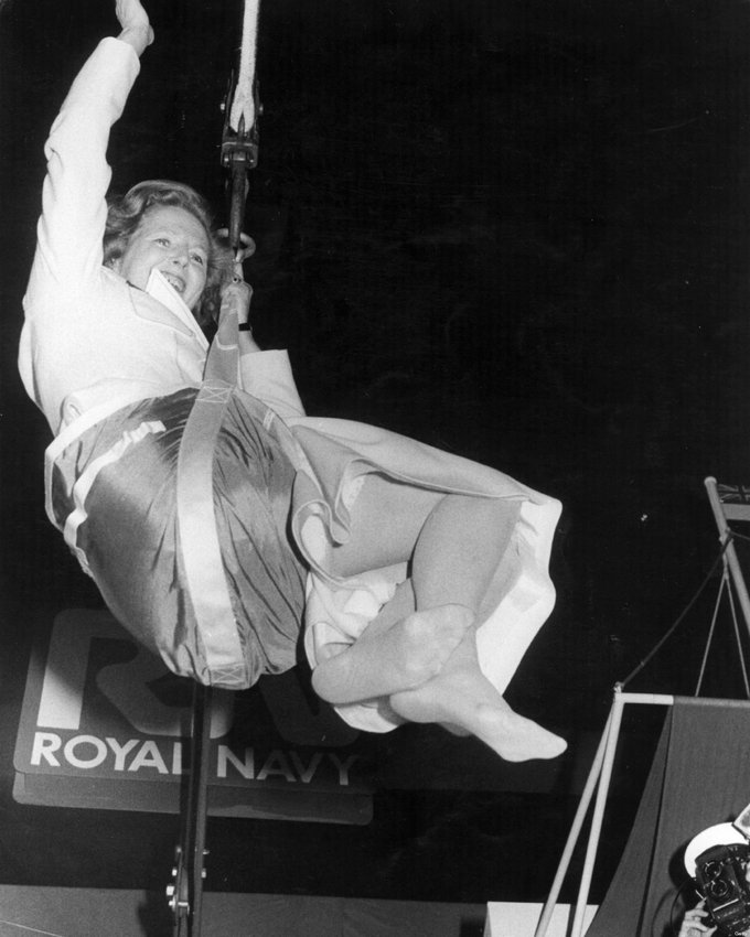 1983_prime_minister_margaret_thatcher_swinging_from_a_hoist_during_a_visit_to_the_royal_navy.jpg