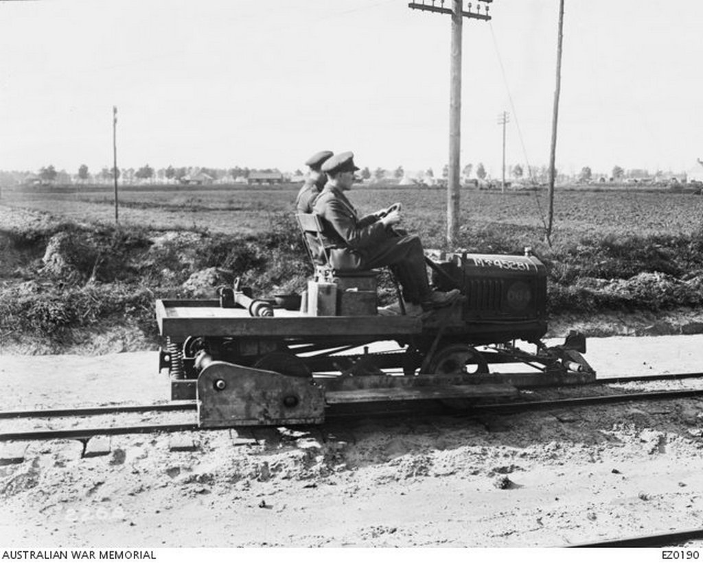 1917_two_officers_travelling_on_a_t_model_ford_chassis_that_has_been_adapted_for_use_on_a_light_railway.jpg