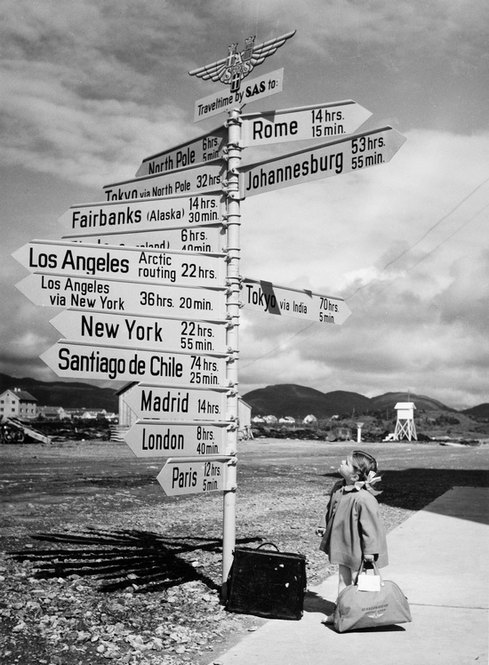 1968_little_girl_looking_at_signs_at_bodo_airport_norway.jpg