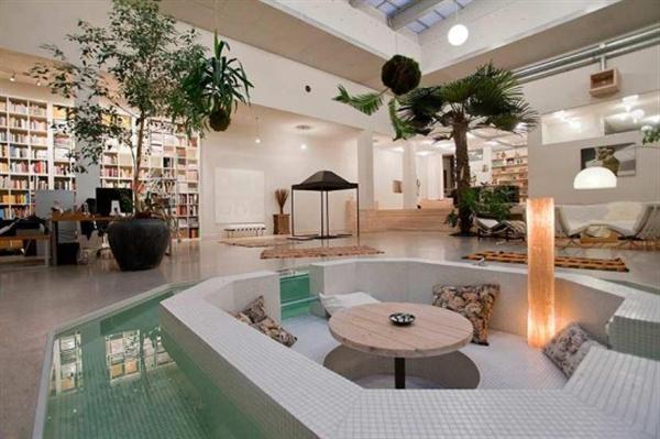 circle-round-lounge-area-with-water-features-luxury-unique-studio-apartment-remodeling-design.jpg