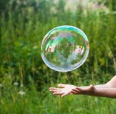 7962713-hand-catching-a-soap-bubble_1.jpg