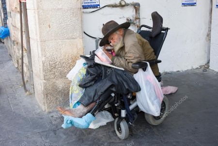depositphotos_64828551-stock-photo-homeless-man-in-wheelchair.jpg