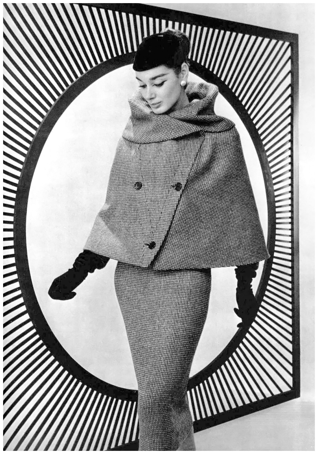 jacky-mazel-is-wearing-tweed-suit-with-short-cape-instead-of-jacket-by-lanvin-castillo-photo-by-philippe-pottier-1956.jpg