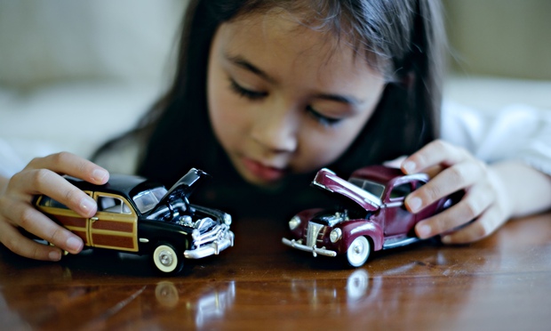 girl-plays-with-toy-cars-012.jpg