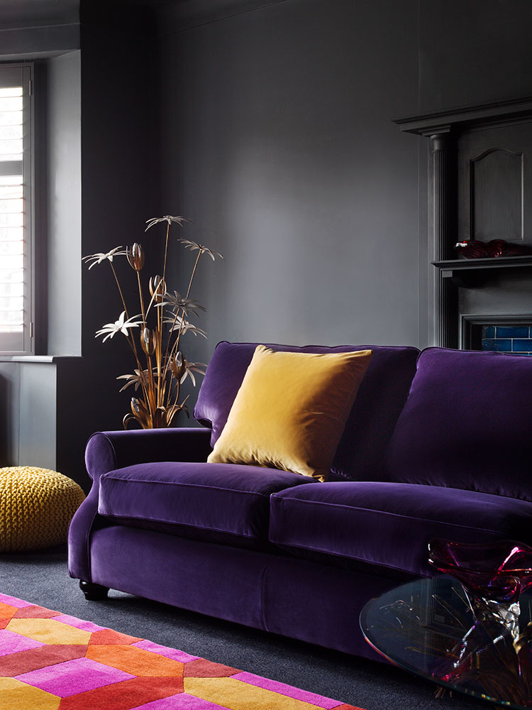 plush-purple-velvet-sofa-with-mustard-yellow-pillow.jpg