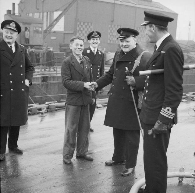1941_winston_churchill_shakes_hands_with_16_year_old_george_smith_at_portsmouth_dockyard_on_31_january_1941_smith_claimed_to_be_the_youngest_worker.jpg