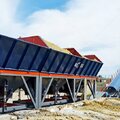 What Advanced Dust Collection Systems Mean for Ready Mix Concrete Plant Price