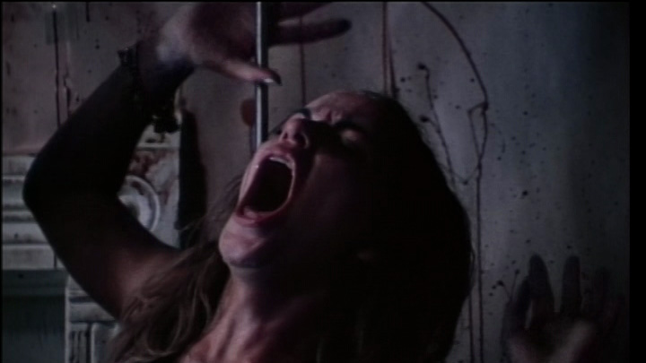 Pams-Teri-McMinn-painful-hanging-on-a-meat-hook-The-Texas-Chain-Saw-Massacre-Movie-1974.jpg