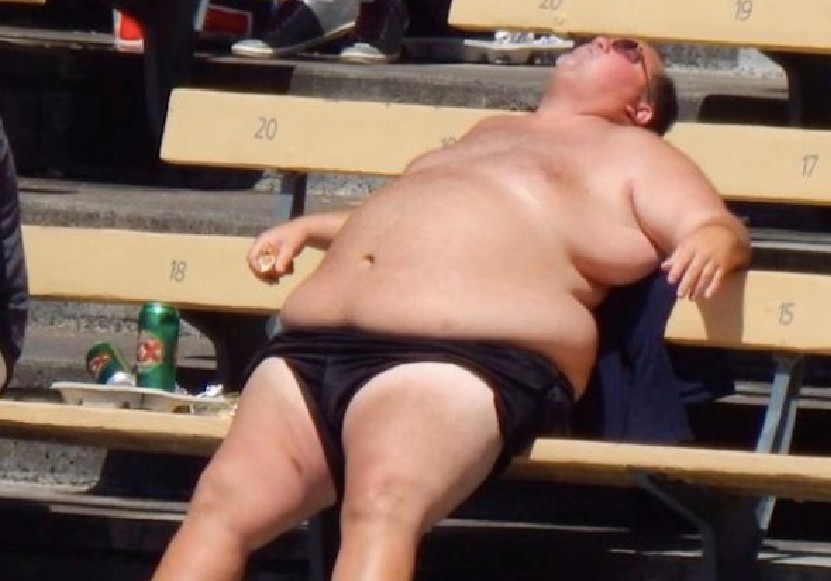fat-man-sun-bathing.jpg