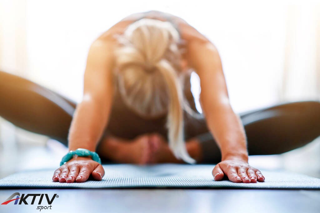 stock-photo-adult-woman-practising-yoga-at.jpg