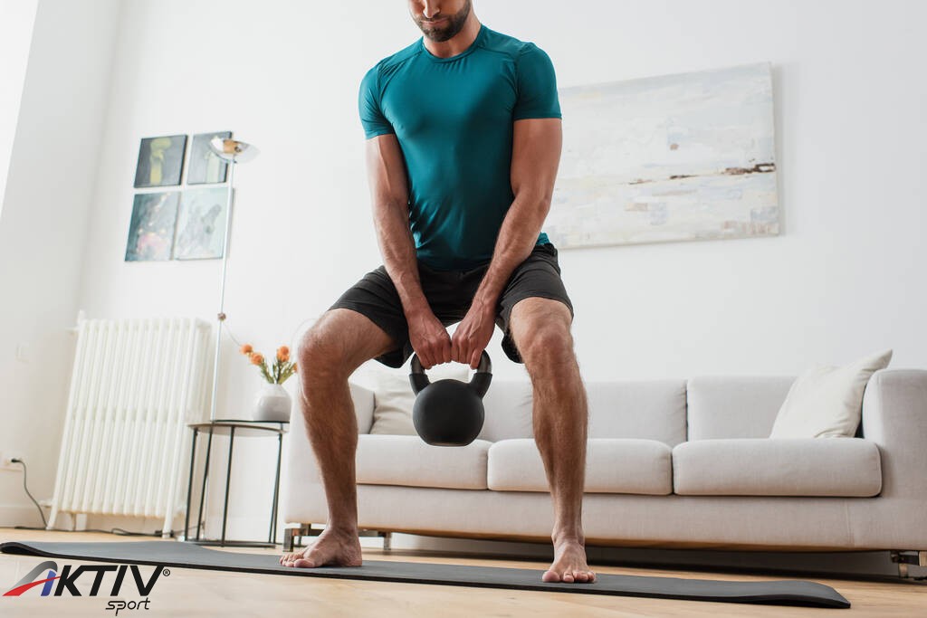 stock-photo-cropped-view-barefoot-man-lifting.jpg