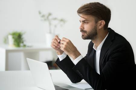 95311117-thoughtful-young-businessman-in-suit-thinking-hard-concerned-about-business-problem-solution-worried.jpg