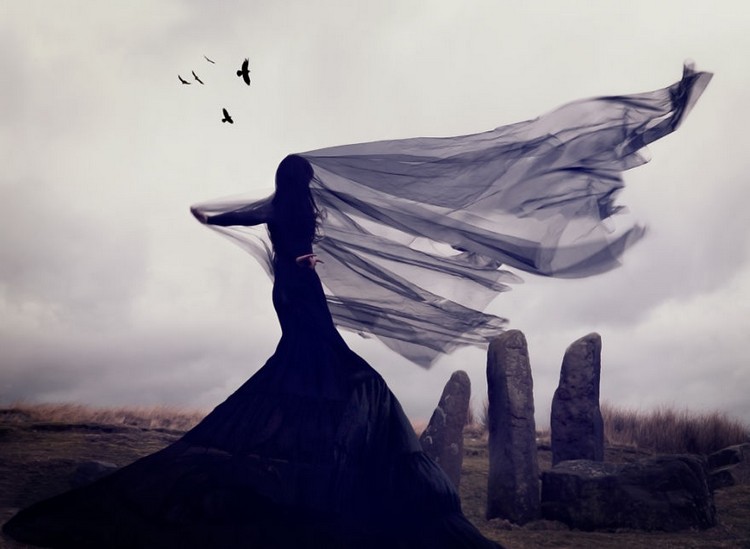 woman-black-veil-ravens-stones.jpg