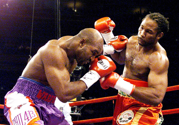 evander-holyfield-lennox-lewis-1999.jpg