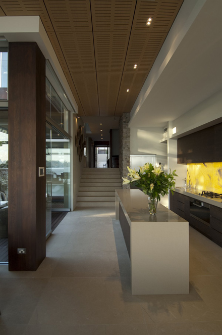 Kitchen-Design-and-Layout-at-Modern-Waterfront-House-Design-by-Bruce-Stafford-Architects.jpg