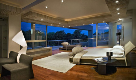 Second-Floor-Bedroom-Interior-at-Impressive-Glass-House-in-Johannesburg-South-Africa-700x413.jpg