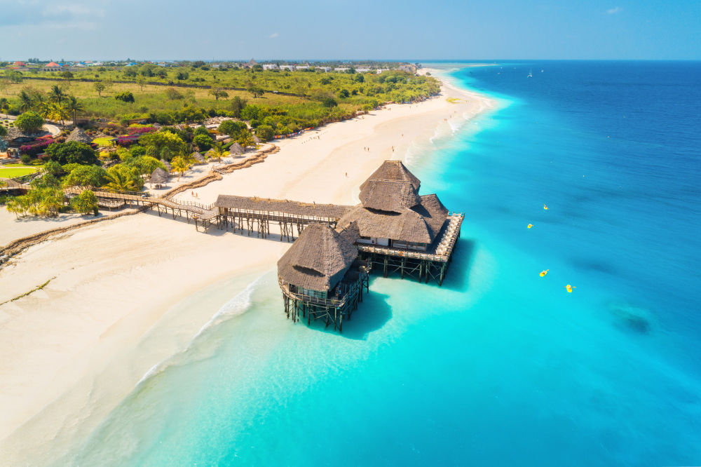aerial-view-beautiful-hotel-water-ocean-sunset.jpg
