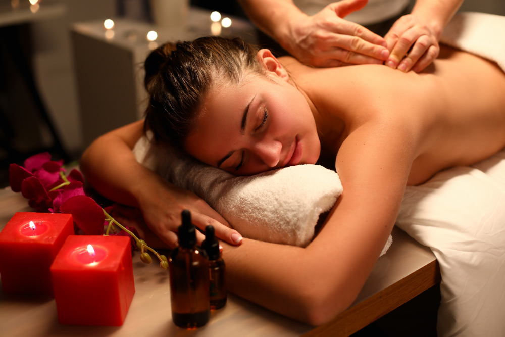 girl-relaxed-lying-massage-near-candles-oil.jpg