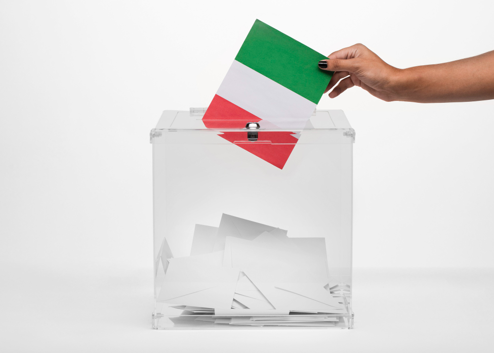 person-putting-italy-flag-card-into-ballot-box.jpg