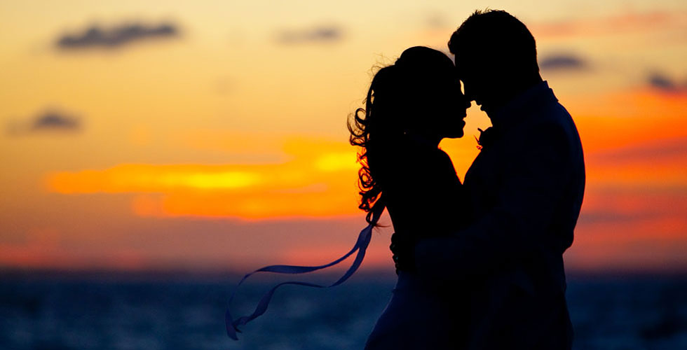 couple-sunset-silhouette-caribbean-beach-wedding.jpg