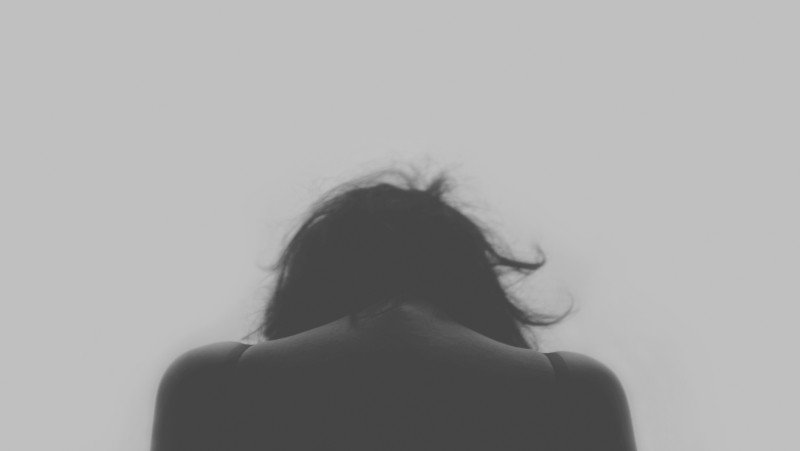 rear-view-of-woman-looking-down-bw.jpg
