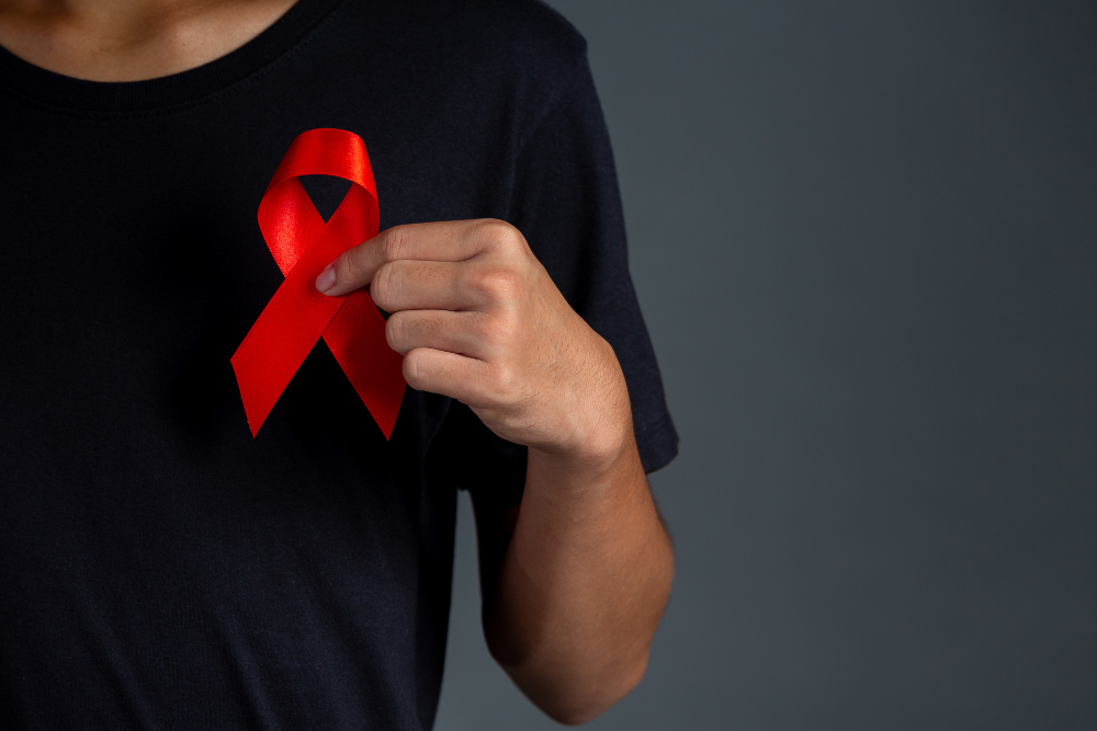 men-holding-red-ribbons-conceptual-awareness-hiv-world-aids-day-world-sexual-health-day.jpg