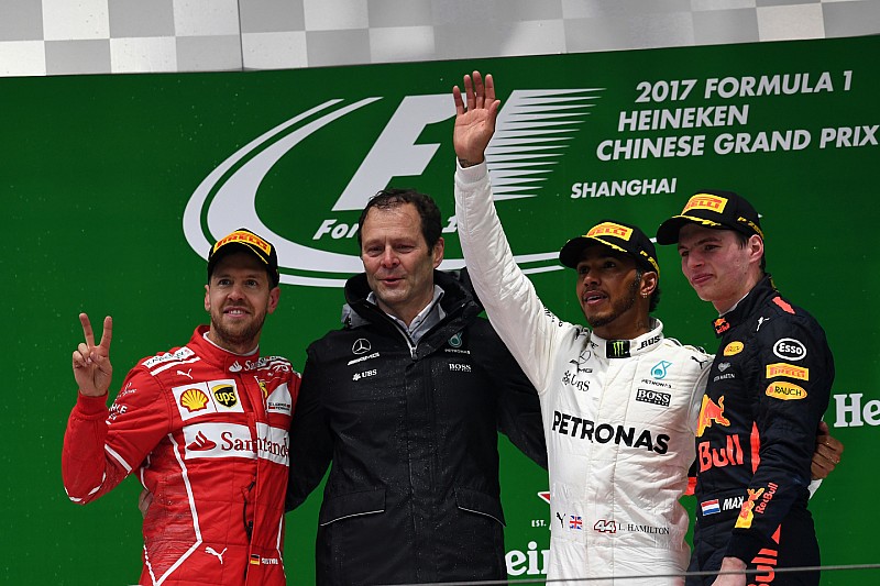 f1-chinese-gp-2017-podium-second-place-sebastian-vettel-ferrari-aldo-costa-mercedes-amg-f1.jpg