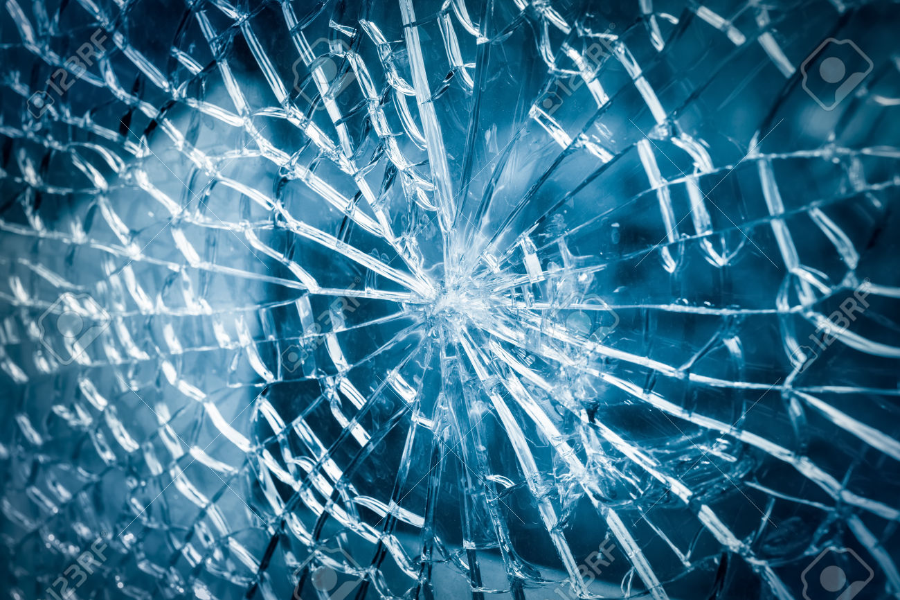 35484062_broken_tempered_glass_closeup_background_of_glass_was_smashed_stock_photo.jpg