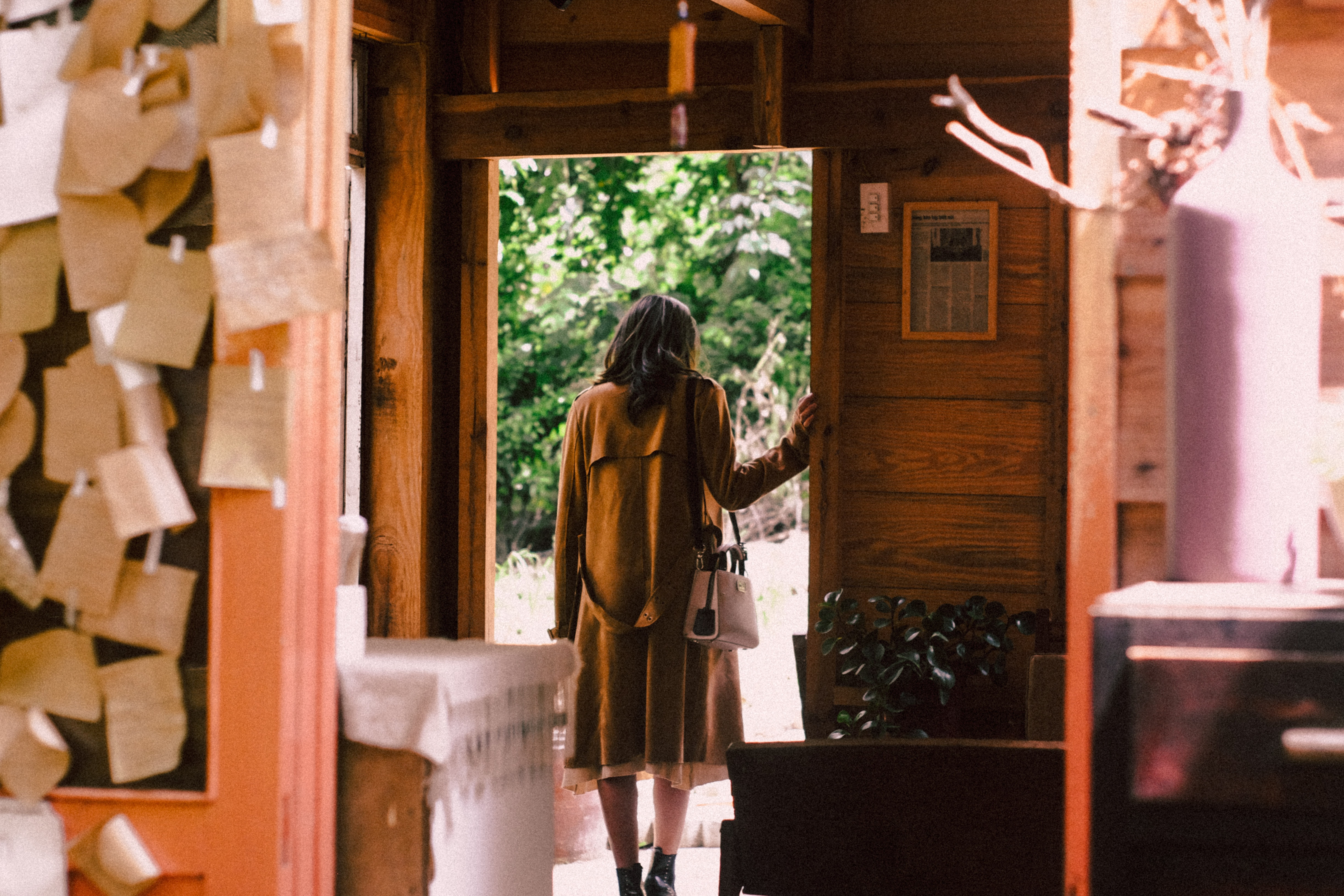 woman-standing-near-open-door-about-to-step-outside-2297663.jpg