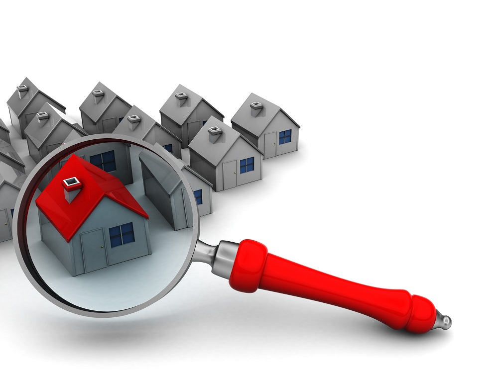 houses-and-magnifying-glass-housing-residential-conveyancing-and-property.jpg
