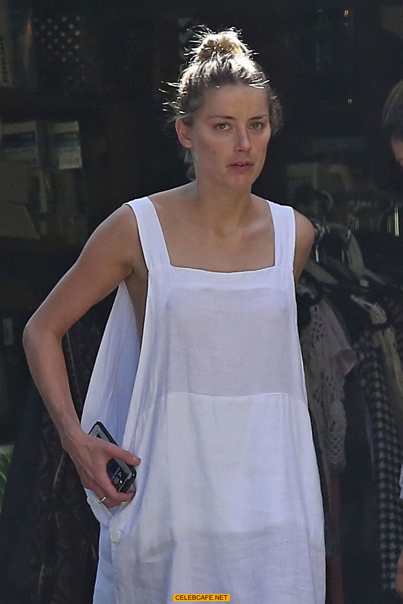 amber_heard_has_a_nip-slip_while_cleaning_out_her_garage_in_la_07302018_3.jpg