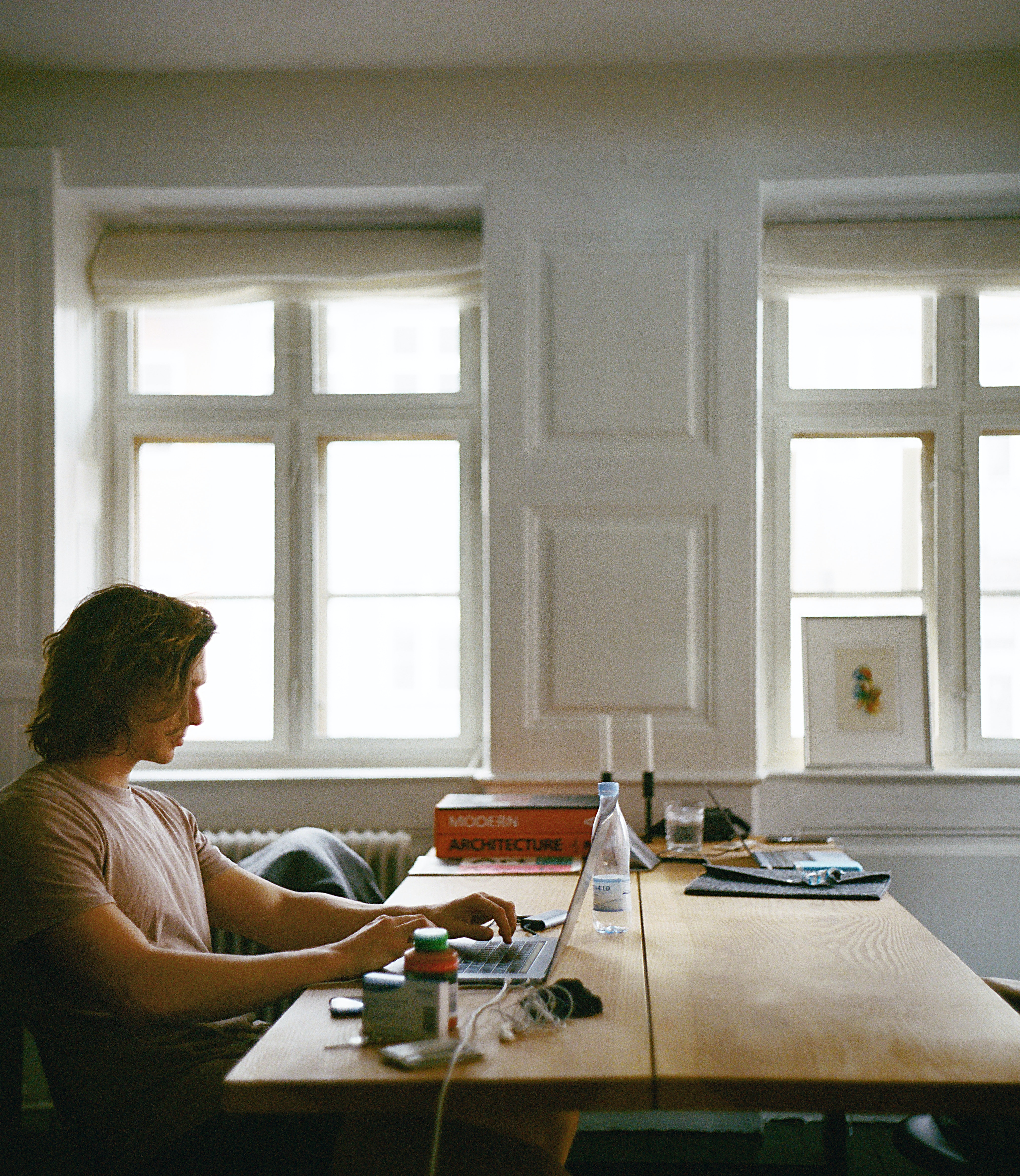 man-sitting-while-using-laptop-2825936.jpg