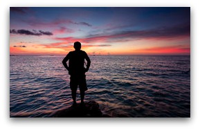 silhouette-single-man-sunset-watching-42476115.jpg