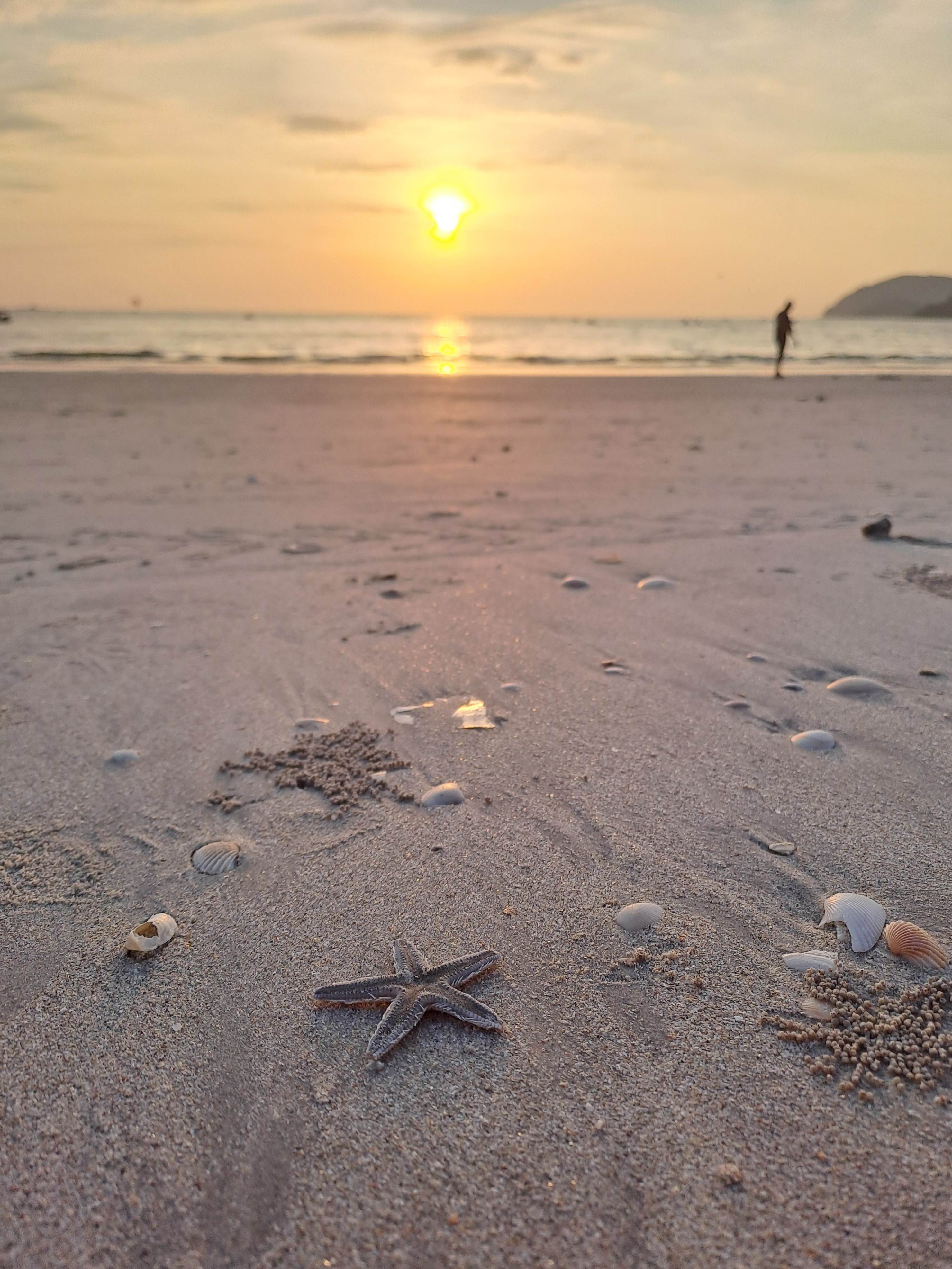 Naplemente Pantai Cenang felett.