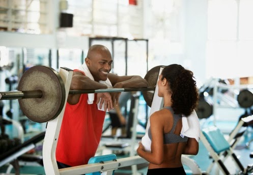 72894508-woman-and-man-talking-in-gym-gettyimages.jpeg