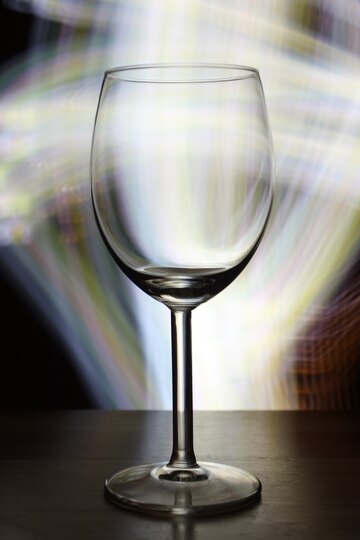 vertical-selective-focus-shot-empty-wine-glass-with-blurry-lights_181624-33015.jpg