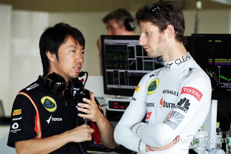 f1-japanese-gp-2013-romain-grosjean-lotus-f1-team-with-ayao-komatsu-lotus-f1-team-race-eng.jpg