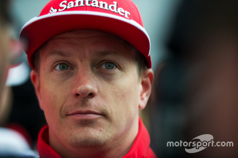 f1-russian-gp-2015-kimi-raikkonen-ferrari-with-the-media_1.jpg