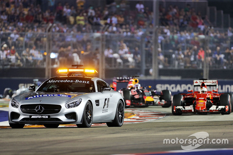 f1-singapore-gp-2015-sebastian-vettel-ferrari-sf15-t-leads-behind-the-fia-safety-car_2.jpg