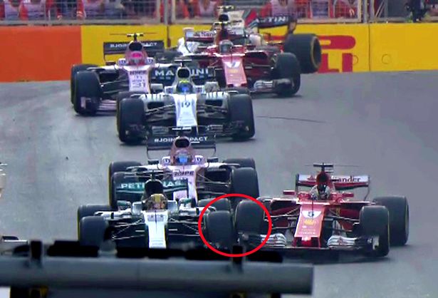 pay-pxl_f1_azerbaijan_hamilton_vettel_clash_09c.jpg