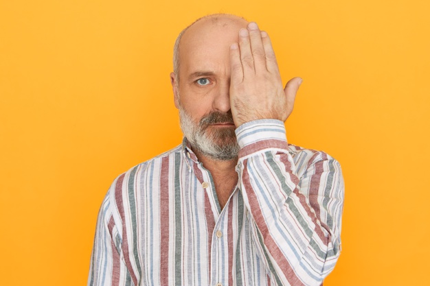 kep_blog_2010_people-age-health-retirement-concept-unshaven-bald-retired-man-striped-shirt-covering-one-eye-with-hand-having-vision-tested-ophthalmology-clinic-able-see-nearby-objects_343059-2290.jpg