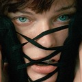 Milla Jovovich topless