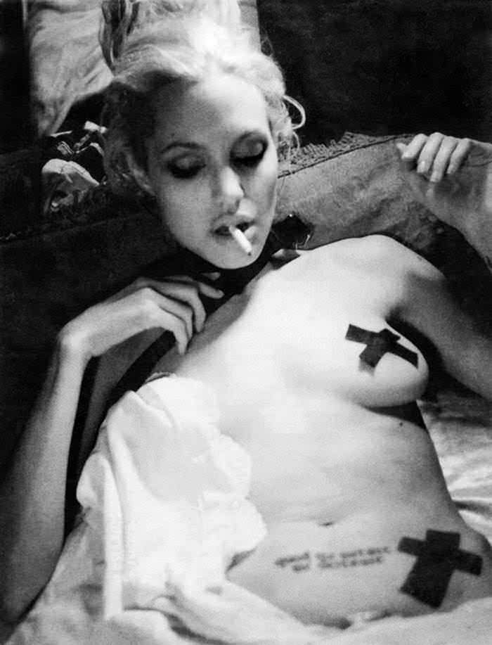 angelina-jolie-nude-with-black-cross-pasties-photoshoot-1.jpg