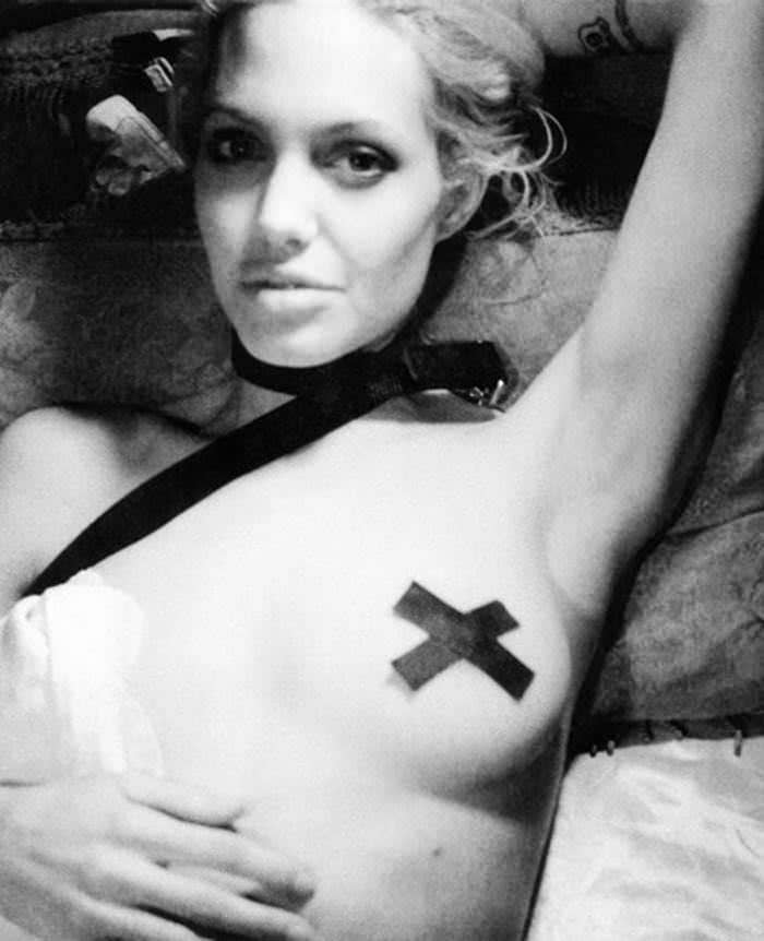 angelina-jolie-nude-with-black-cross-pasties-photoshoot-3.jpg