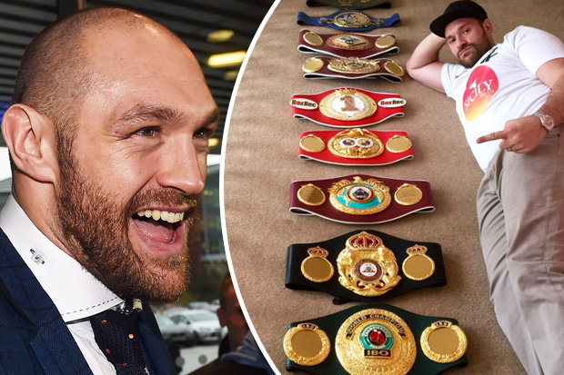 tyson-fury-poses-with-all-his-belts-552674.jpg