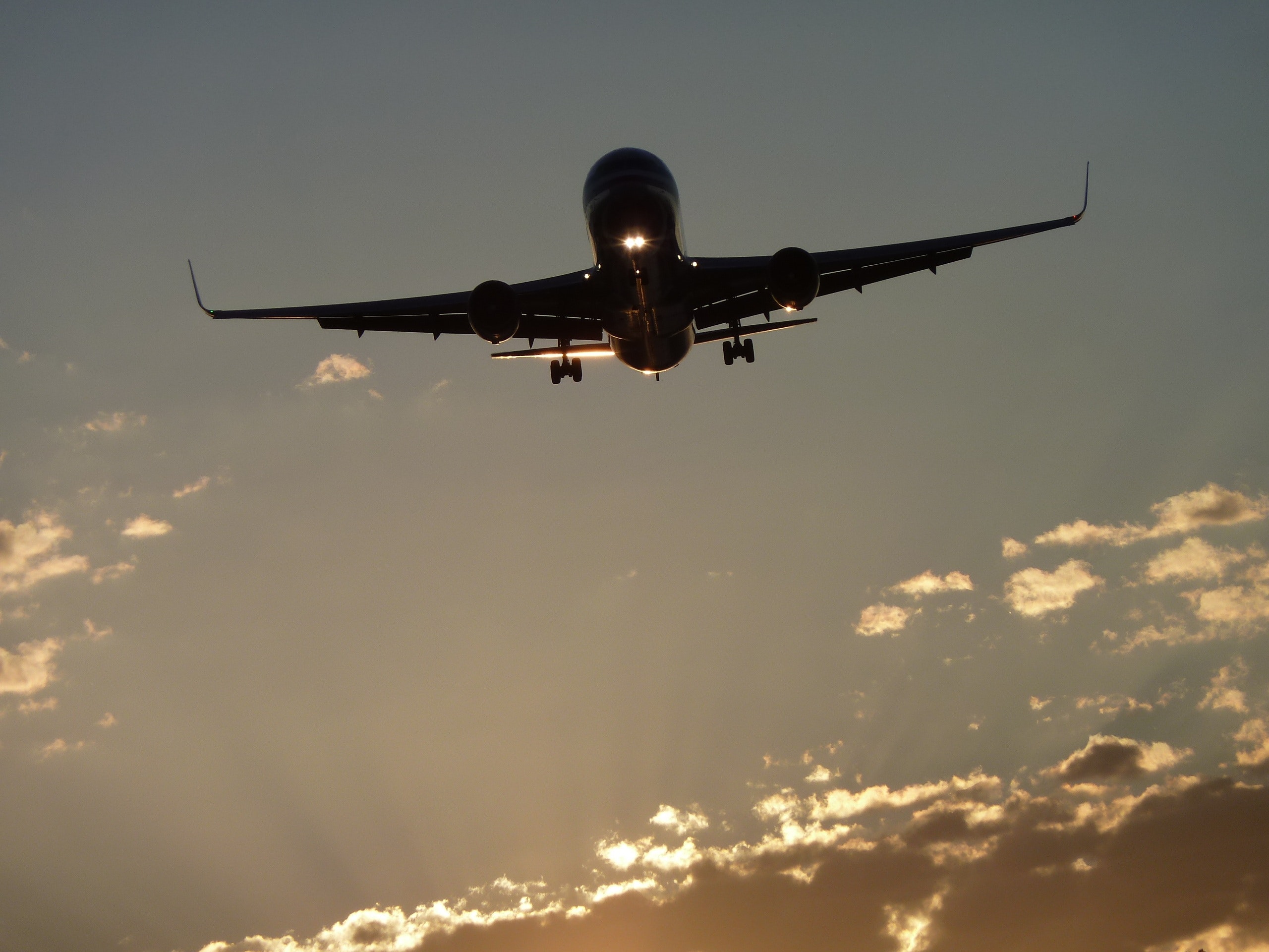 airplane-on-sky-during-sunset-48786.jpg