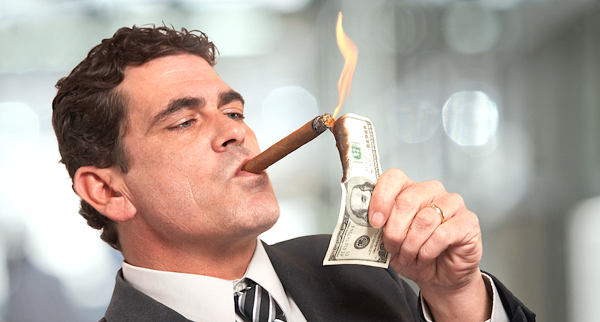 rich-man-lighting-cigar-with-100-bill-shutterstock-800x430_1.png