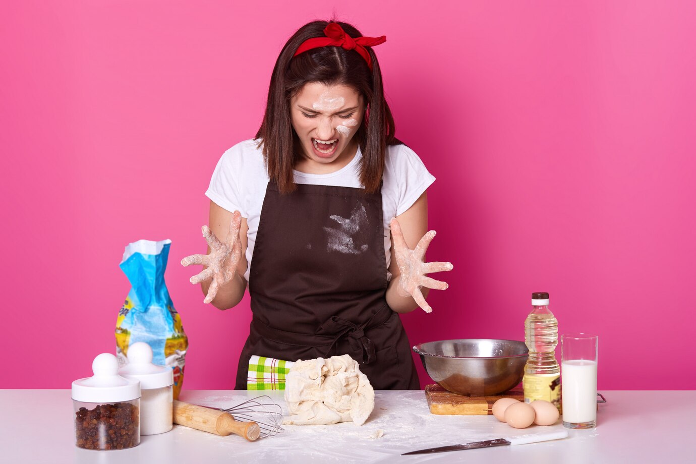 photo-angry-brunette-baker-being-sick-tired-kneading-dough-dressed-casual-t-shirt-brown-apron-dirty-with-flour-female-spreads-her-fingers-while-shouting-something-food-concept_176532-8416.jpg