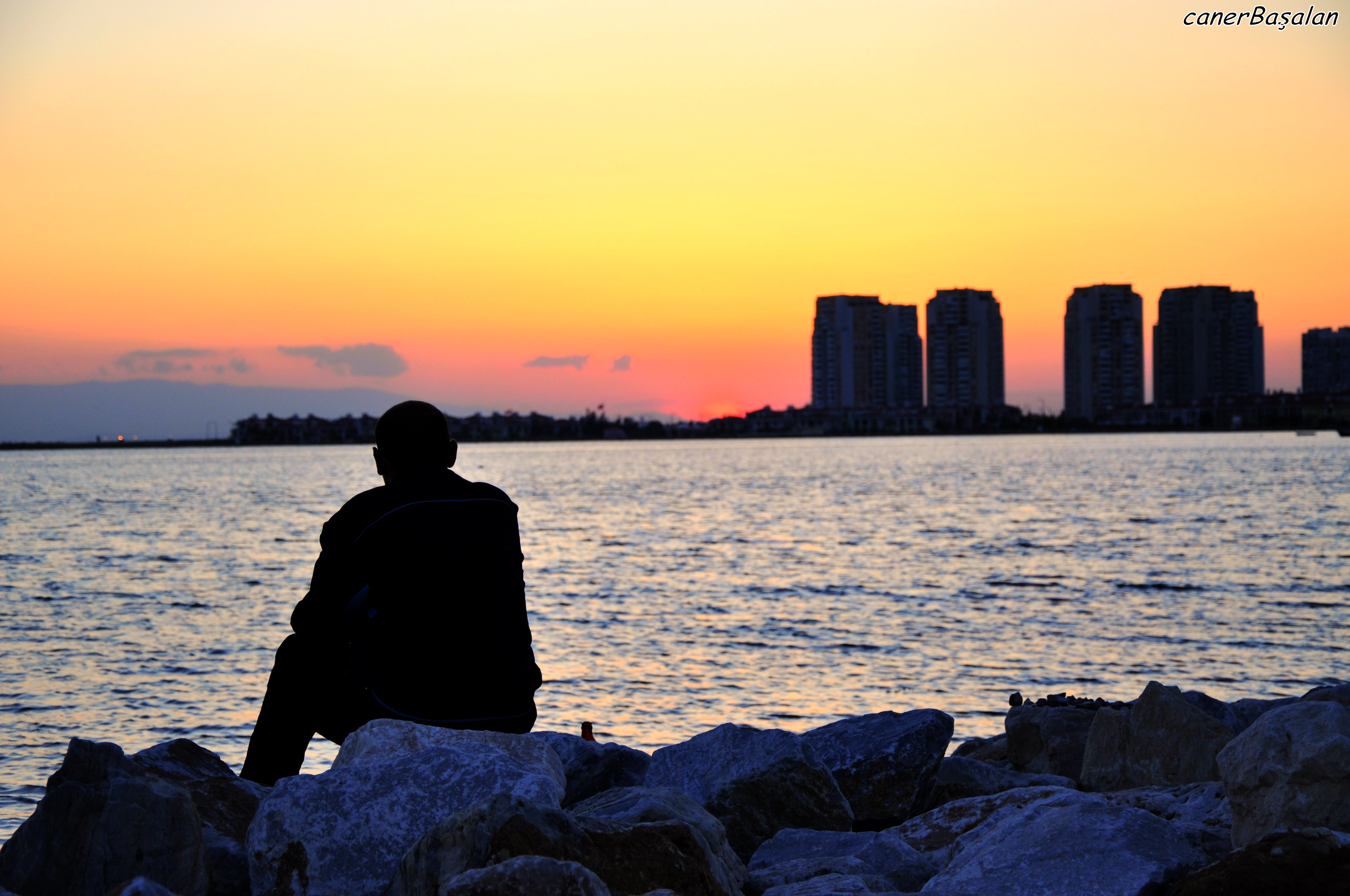 a_lonely_guy_watching_sundown_by_svenng-d3g1uu4.jpg