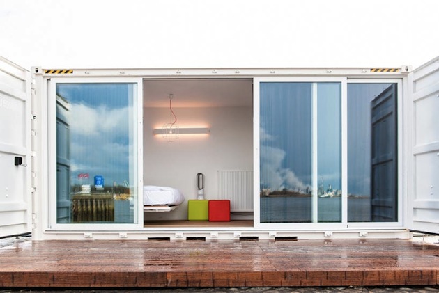 7 shipping containers with four rooms and the other three being a lounge sauna kitchen and breakfast space.jpeg